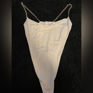 Small cream bodysuit with gold chain straps